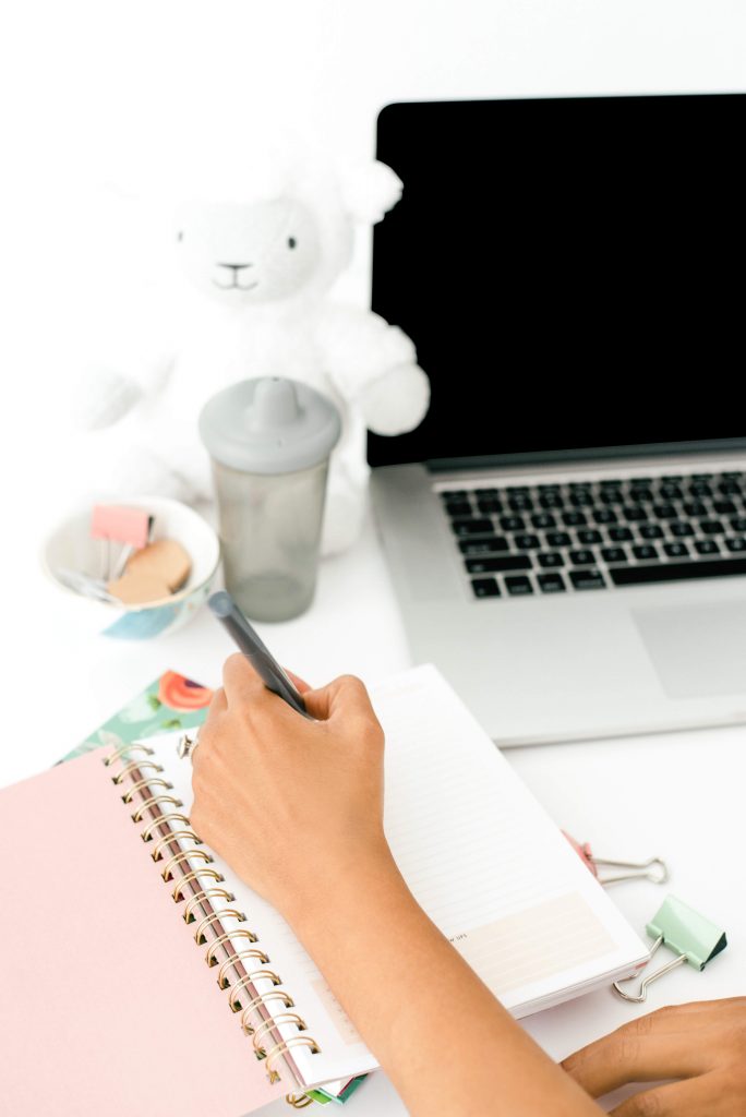 busy mom blogger macbook sippy cup and stuffed animal